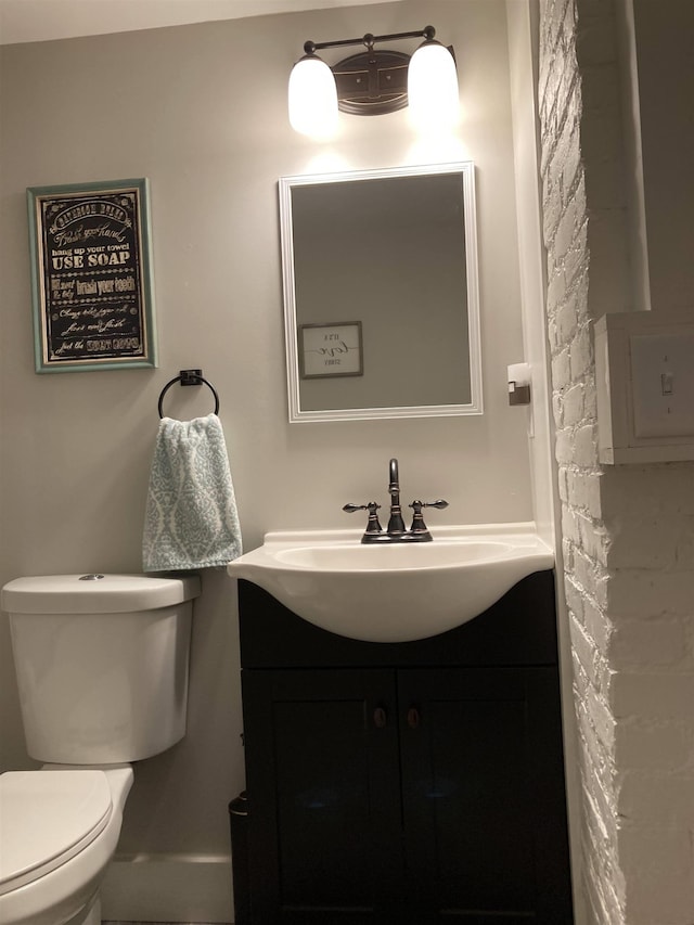 319 Main St, Montgomery, VT 05471 - bathroom featuring vanity and toilet