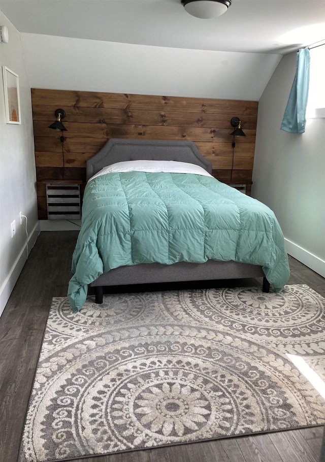 319 Main St, Montgomery, VT 05471 - bedroom featuring lofted ceiling, wood finished floors, and baseboards