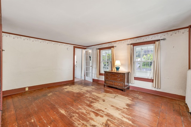 31 Prospect St, Franklin, NH 03235 - unfurnished room with hardwood / wood-style flooring, ornamental molding, and baseboards