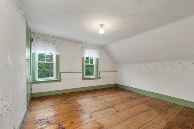 31 Prospect St, Franklin, NH 03235 - additional living space featuring wood-type flooring and vaulted ceiling