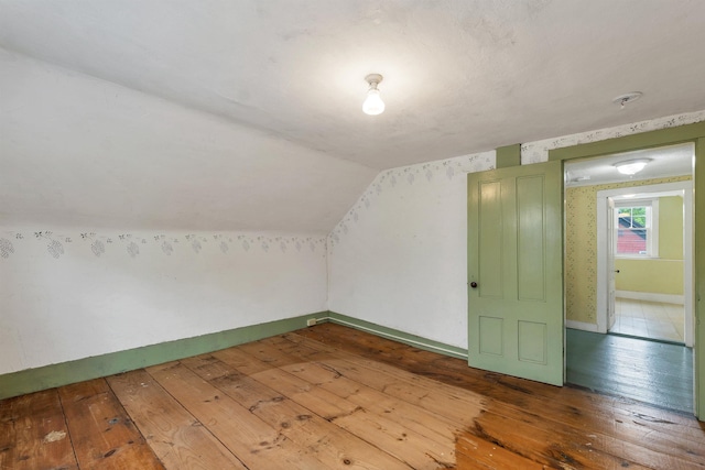 31 Prospect St, Franklin, NH 03235 - additional living space featuring wood-type flooring, vaulted ceiling, and baseboards