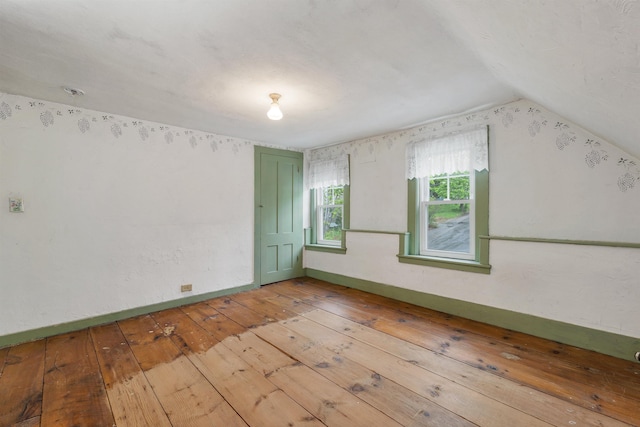 31 Prospect St, Franklin, NH 03235 - additional living space featuring light wood-style floors and vaulted ceiling