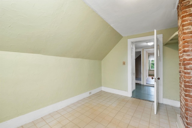 31 Prospect St, Franklin, NH 03235 - additional living space featuring lofted ceiling and baseboards