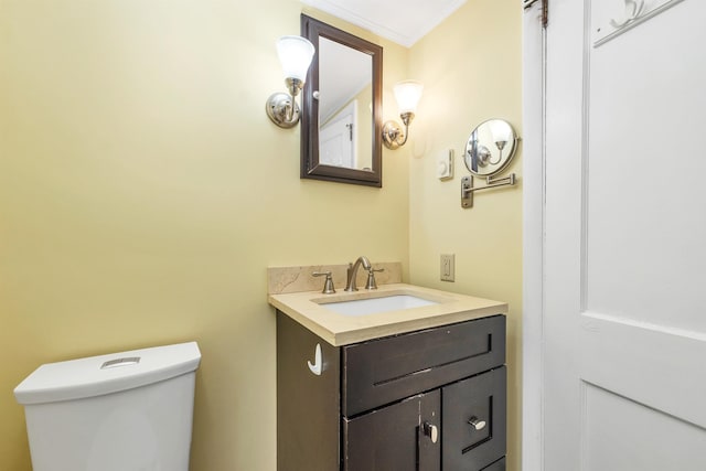 31 Prospect St, Franklin, NH 03235 - bathroom featuring vanity, toilet, and crown molding
