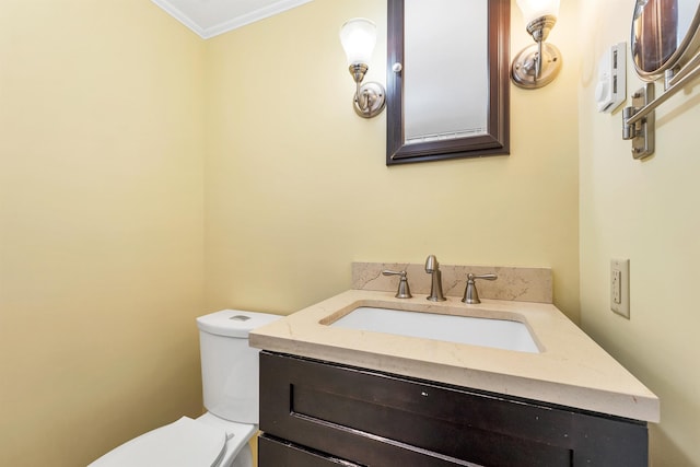 31 Prospect St, Franklin, NH 03235 - bathroom featuring crown molding, toilet, and vanity