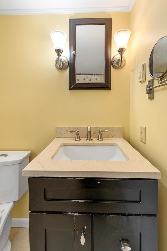31 Prospect St, Franklin, NH 03235 - bathroom featuring toilet, vanity, and crown molding