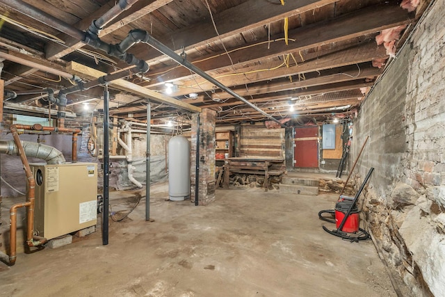 31 Prospect St, Franklin, NH 03235 - unfinished basement featuring electric panel and a heating unit