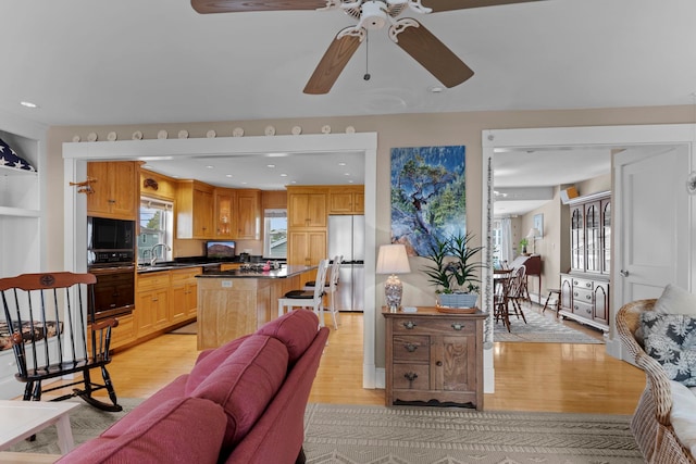 745 Ocean Blvd, Hampton, NH 03842 - living room with light wood-style floors, ceiling fan, and recessed lighting