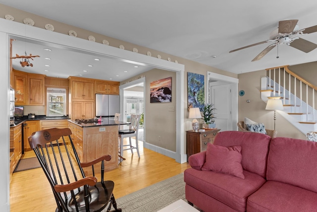 745 Ocean Blvd, Hampton, NH 03842 - living area featuring light wood-style floors, a ceiling fan, stairs, recessed lighting, and healthy amount of natural light