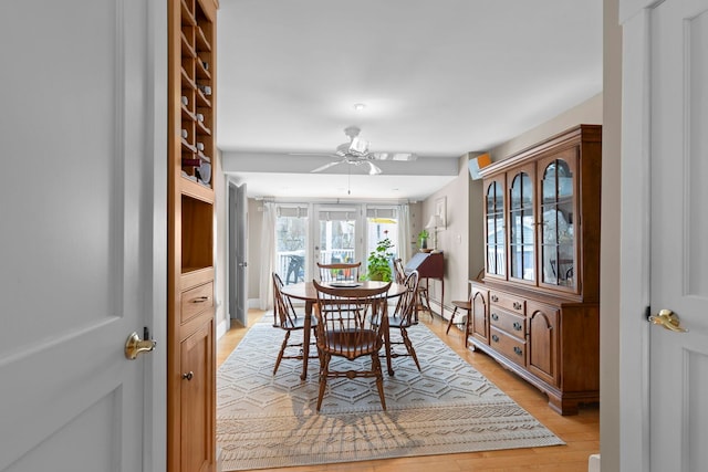 745 Ocean Blvd, Hampton, NH 03842 - dining space featuring light wood finished floors and a ceiling fan