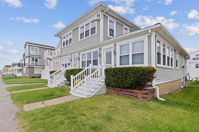745 Ocean Blvd, Hampton, NH 03842 - view of front of house with a front lawn