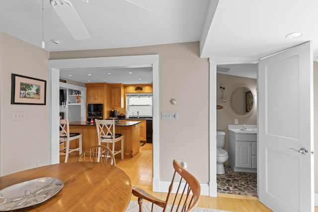 745 Ocean Blvd, Hampton, NH 03842 - dining room featuring light wood-type flooring, baseboards, and recessed lighting