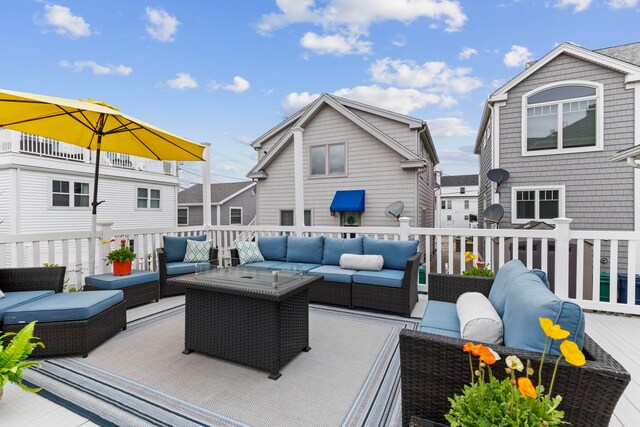 745 Ocean Blvd, Hampton, NH 03842 - wooden deck featuring an outdoor living space
