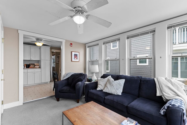 745 Ocean Blvd, Hampton, NH 03842 - carpeted living area featuring a ceiling fan