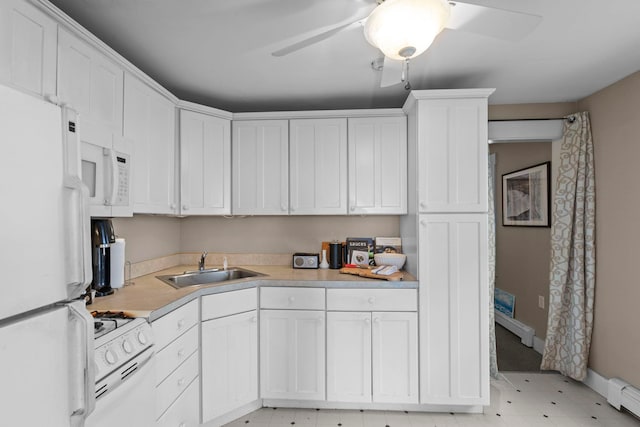 745 Ocean Blvd, Hampton, NH 03842 - kitchen with white appliances, a sink, ceiling fan, white cabinets, and light countertops