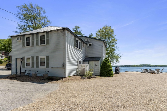 556 Weirs Blvd Unit 6, Laconia, NH 03246 - view of front of house featuring a water view