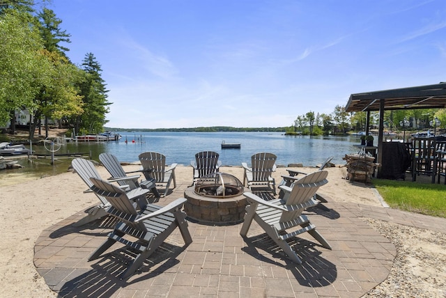556 Weirs Blvd Unit 6, Laconia, NH 03246 - view of patio / terrace featuring a fire pit and a water view