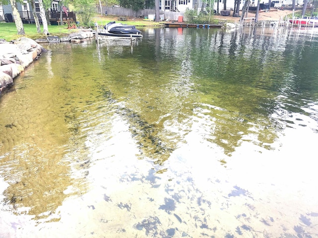 556 Weirs Blvd Unit 6, Laconia, NH 03246 - water view featuring a boat dock