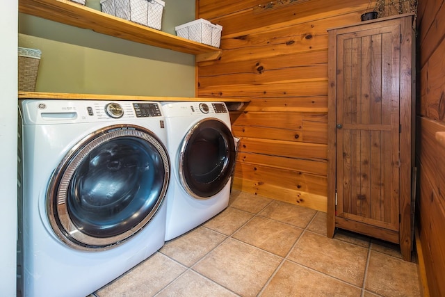 213 Singing Cedars Rd, Orwell, VT 05760 - laundry area with washer and clothes dryer and light tile patterned floors