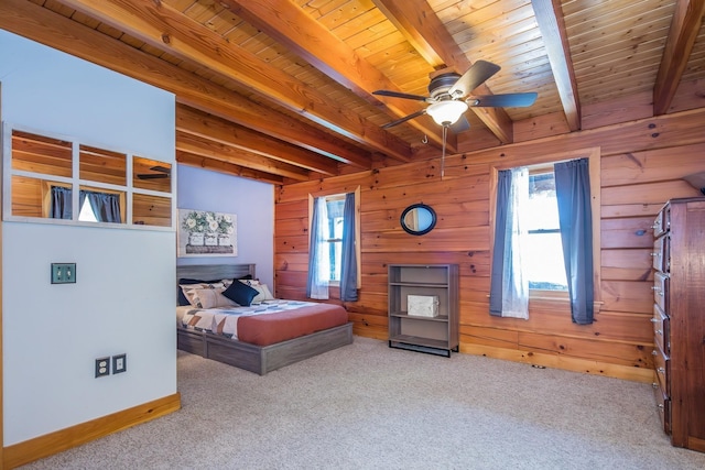 213 Singing Cedars Rd, Orwell, VT 05760 - carpeted bedroom featuring wood ceiling with exposed beams, wood walls, and baseboards