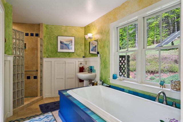 44 Clarksville Rd, Tunbridge, VT 05077 - bathroom with a tub, a walk in shower, a sink, and tile patterned flooring