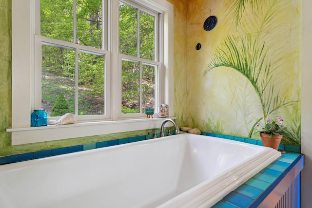 44 Clarksville Rd, Tunbridge, VT 05077 - bathroom featuring a soaking tub and healthy amount of natural light