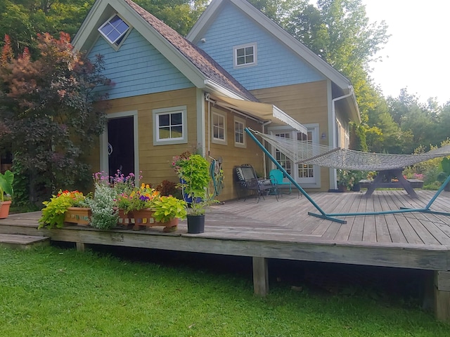 44 Clarksville Rd, Tunbridge, VT 05077 - rear view of property featuring a deck and a lawn