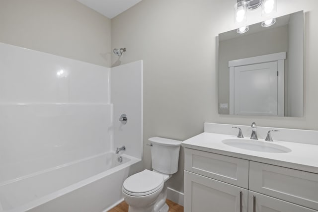 280 Sterling Dr, Laconia, NH 03246 - bathroom featuring vanity, toilet, bathing tub / shower combination, wood finished floors, and baseboards