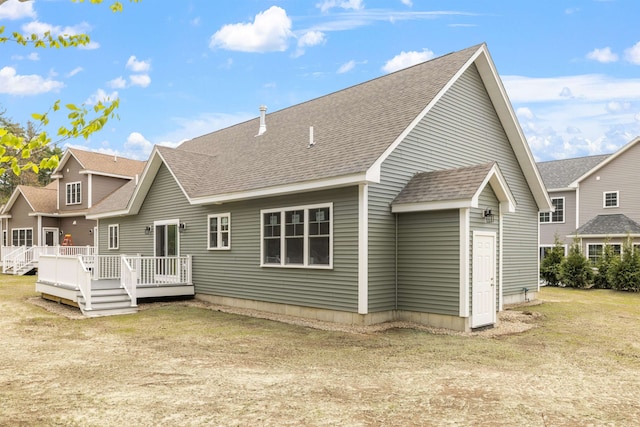 280 Sterling Dr, Laconia, NH 03246 - rear view of house with a shingled roof and a wooden deck