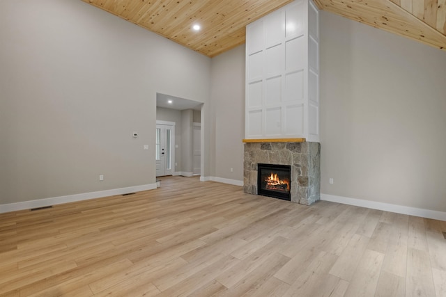 280 Sterling Dr, Laconia, NH 03246 - unfurnished living room with wooden ceiling, light wood finished floors, a stone fireplace, recessed lighting, and high vaulted ceiling