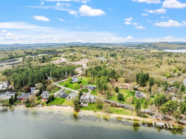 280 Sterling Dr, Laconia, NH 03246 - aerial overview of property's location featuring a large body of water and a heavily wooded area