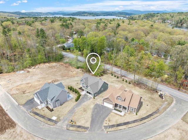 280 Sterling Dr, Laconia, NH 03246 - aerial view of a heavily wooded area and a water and mountain view
