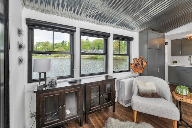 556 Weirs Blvd Unit 4, Laconia, NH 03246 - living area featuring dark wood-style flooring and a water view