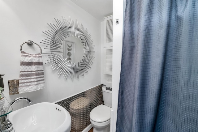 556 Weirs Blvd Unit 4, Laconia, NH 03246 - full bathroom featuring a sink, toilet, and curtained shower