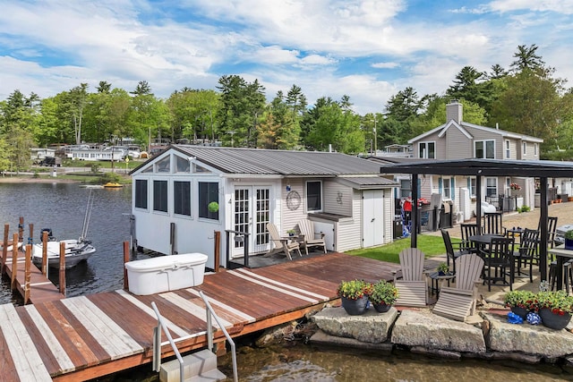 556 Weirs Blvd Unit 4, Laconia, NH 03246 - dock with a deck with water view and view of wooded area