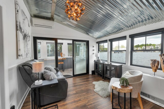 556 Weirs Blvd Unit 4, Laconia, NH 03246 - sunroom featuring vaulted ceiling, a wall unit AC, a chandelier, and a water view