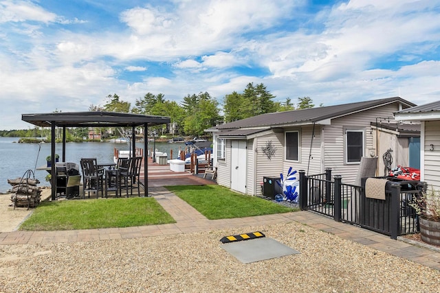 556 Weirs Blvd Unit 4, Laconia, NH 03246 - exterior space featuring boat lift, a boat dock, a water view, and metal roof