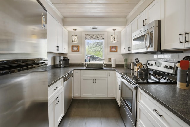 6049 Mountain Rd Unit 20, Stowe, VT 05672 - kitchen featuring stainless steel appliances, a sink, ornamental molding, white cabinetry, and wooden ceiling