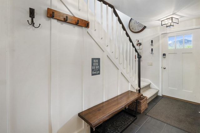 6049 Mountain Rd Unit 20, Stowe, VT 05672 - foyer entrance with stairs and tile patterned floors