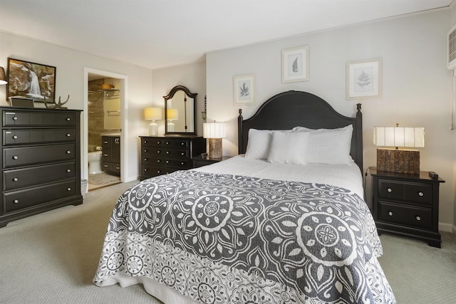 6049 Mountain Rd Unit 20, Stowe, VT 05672 - bedroom with carpet floors, baseboards, and ensuite bath