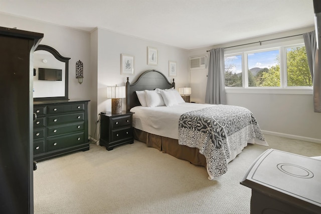 6049 Mountain Rd Unit 20, Stowe, VT 05672 - bedroom featuring light carpet, baseboards, and an AC wall unit