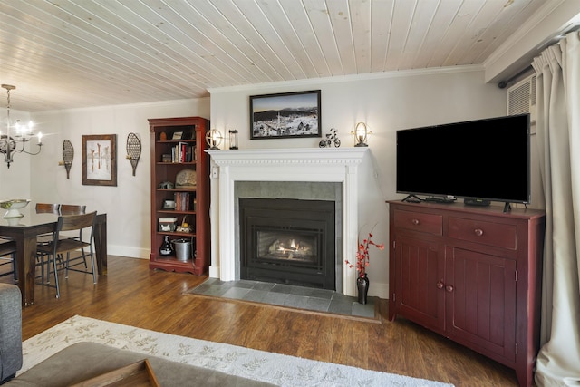 6049 Mountain Rd Unit 20, Stowe, VT 05672 - living room with crown molding, wood ceiling, a fireplace with flush hearth, dark wood-style flooring, and a chandelier