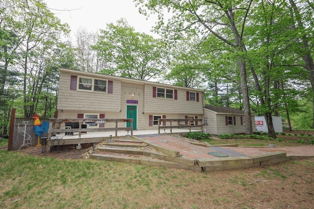 11 Riverside Dr, Rochester, NH 03867 - back of property with a deck