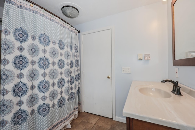 11 Riverside Dr, Rochester, NH 03867 - full bath featuring vanity, tile patterned flooring, curtained shower, and baseboards