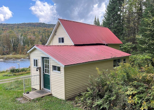 43 Kimberly Ln, Westmore, VT 05871 - view of outdoor structure featuring a forest view and a water view