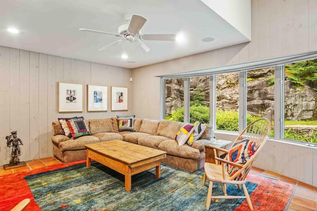 75 Westwood Rd, Sunapee, NH 03782 - living area with a ceiling fan and wood walls