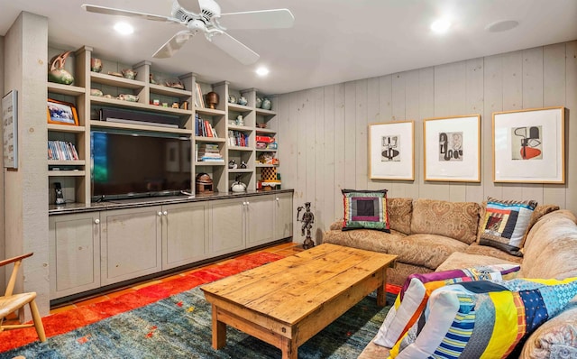 75 Westwood Rd, Sunapee, NH 03782 - living room featuring a ceiling fan and wood walls