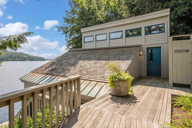75 Westwood Rd, Sunapee, NH 03782 - wooden terrace with a water view