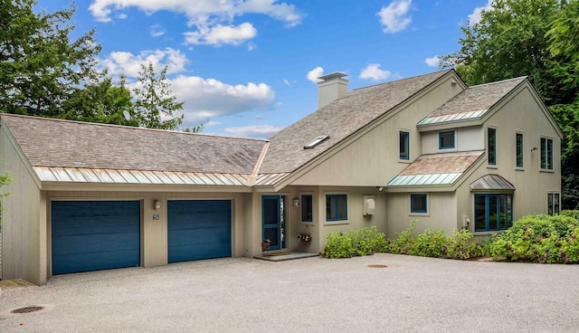 75 Westwood Rd, Sunapee, NH 03782 - multi unit property with a standing seam roof, metal roof, a chimney, asphalt driveway, and an attached garage