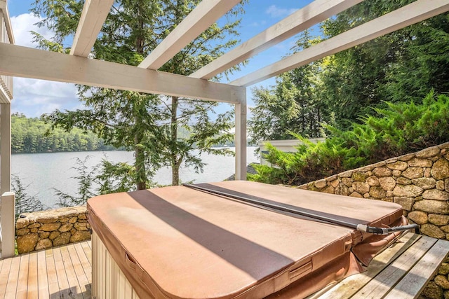 75 Westwood Rd, Sunapee, NH 03782 - deck featuring a hot tub, a water view, and a pergola